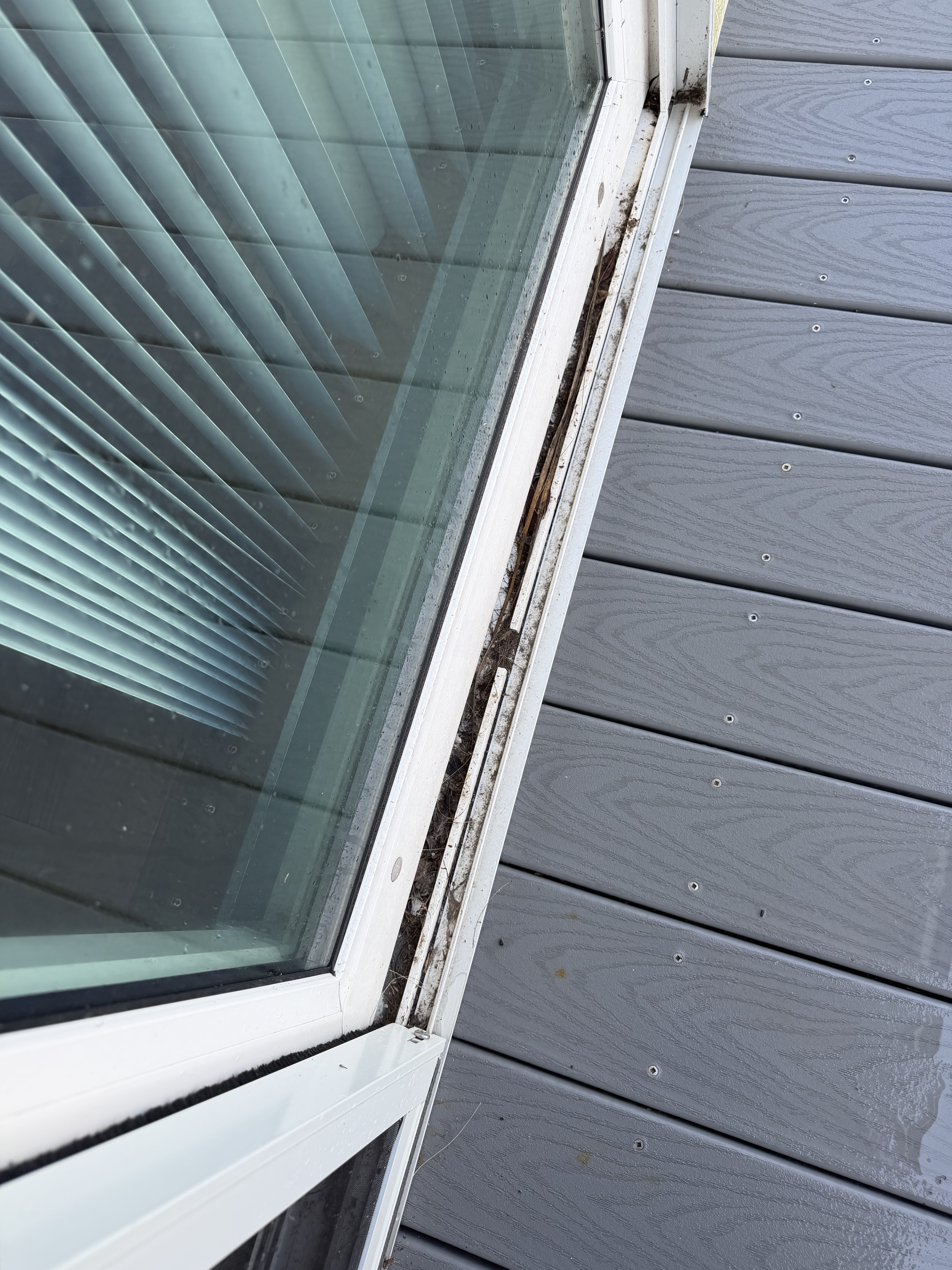 Sliding door track before and after — threshold and tracks cleared.