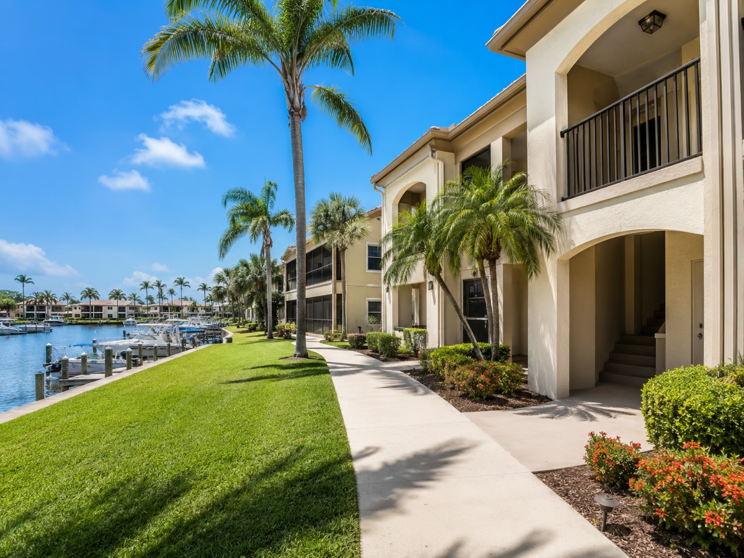 Illustrative HOA commons rinse — multi-family waterfront community walks.