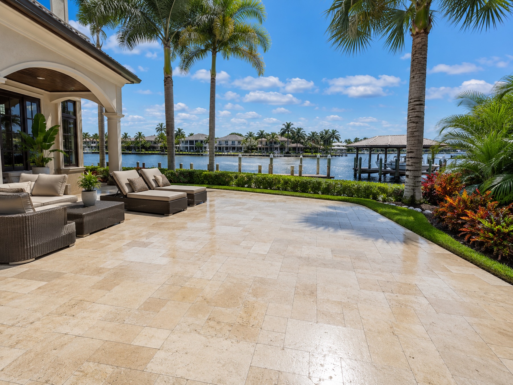 Illustrative patio cleaning — covered loggia with clean travertine tile.